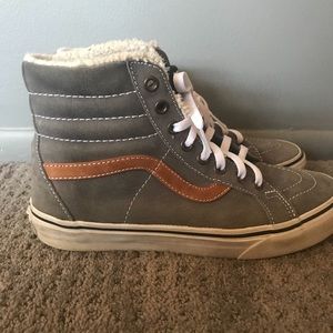 Grey hightop vans lined with faux fur